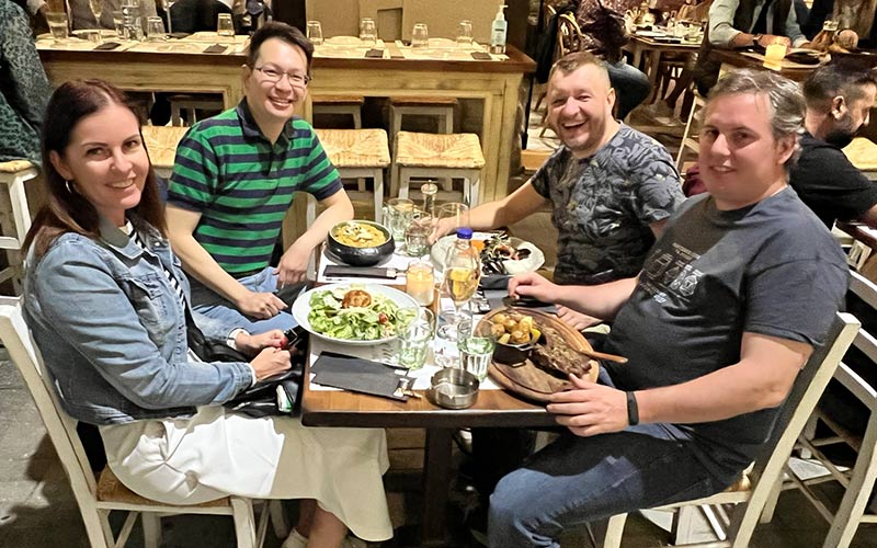 The Hungarian, British and Polish team members enjoying a nice Greek meal